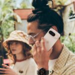man with cell phone to ear